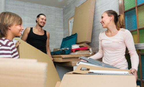 Removal team handling items during a booked UK house move