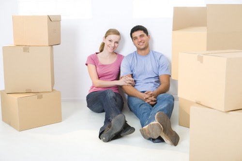 A moving crew assessing a property before loading items