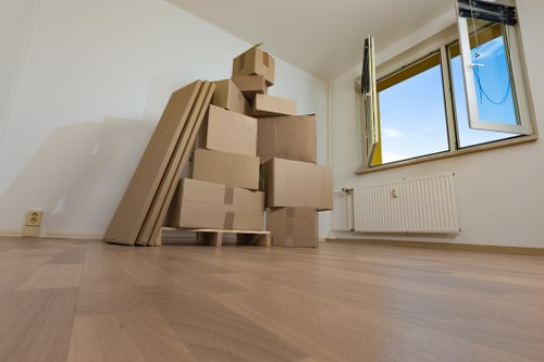 Packed moving boxes ready for removal services in Tooting