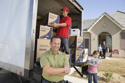 Removal team following a safe and organised working process