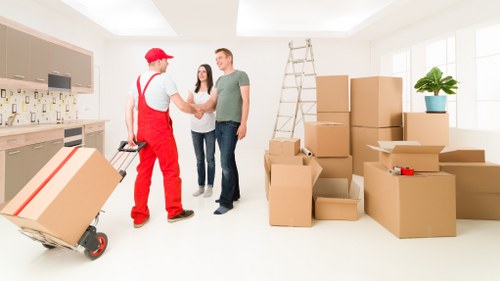 Loading furniture into a removal van in Tooting