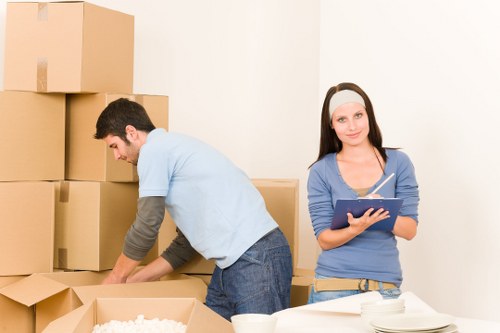 Packing and labelling boxes for business relocation in Tooting