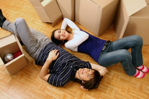 Tooting removals team handling boxes and furniture with care